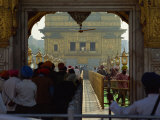 Sikhs at the Entrance to the Golden Temple, Crossing Guru's Bridge, Amritsar, Punjab, India Photographic Print by Jeremy Bright