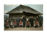 Lahu Shi Tribesmen in Front of Thatched Bamboo House Photographic Print by W. Robert Moore