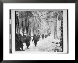 American soldiers on their tay to cut Off St. Vith Houffalize Road in Belgium, During WWII  Poster by Richard A. Massenge