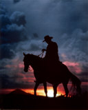 Cowboy and Sunset Posters by Ewing Galloway