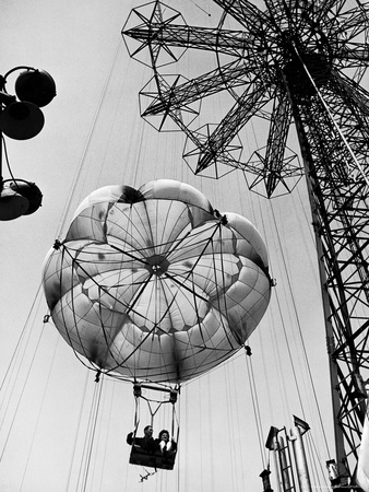 Couple Taking a Ride on the 300 Ft. Parachute Jump at Coney Island Amusement Park Photographic Print