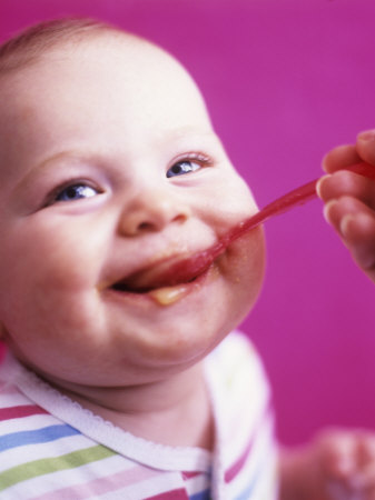 Baby Being Fed Baby Food Photographic Print