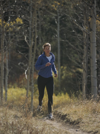 A Runner Takes an Autumn Jog Along Cache Creek Photographic Print
