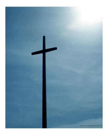images of sun in sky. Cross against blue sky with