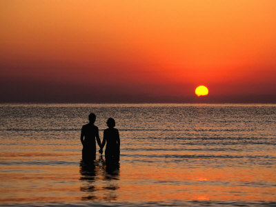 Couple Holding Hands at Sunset Over the Bay of Alcudia, Mallorca, 