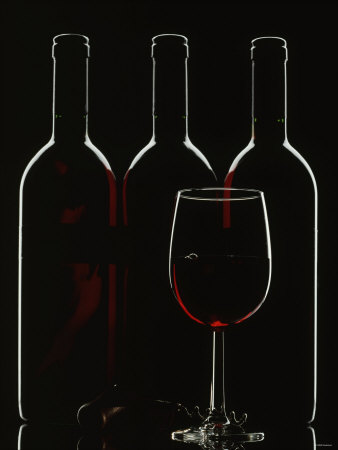 red wine glass. Silhouette of Three Red Wine