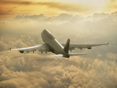 Jumbo Jet Above Clouds at