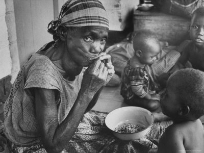 spencer-terence-mother-and-starving-children-eating.jpg