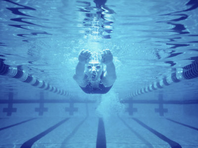 young-woman-swimming-underwater.jpg