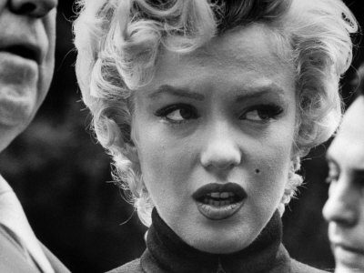 Marilyn Monroe Face Reporters After Announcement Divorce From Baseball Great Joe DiMaggio Premium Photographic Print by George Silk!