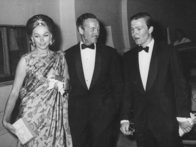Actor David Niven with Wife and Son on their Way to Red Cross Benefit Ball 