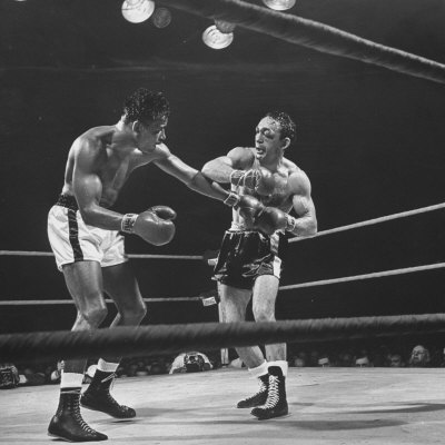 silk-george-boxers-ray-robinson-and-carmen-basilio-fighting-in-the-ring.jpg