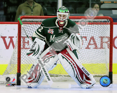 Niklas Backstrom 2010-11 Action Photo