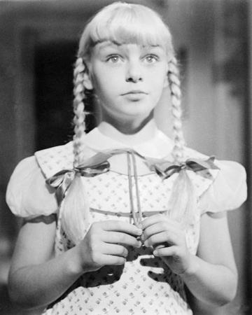 http://cache2.allpostersimages.com/p/LRG/54/5488/FKBWG00Z/posters/patty-mccormack-the-bad-seed.jpg