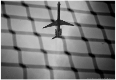 Airplane Through Fence B/W Prints