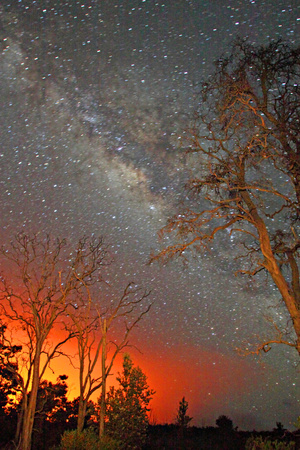 The Milky Way Shines As the Glow of Lava Light Reflects in the Sky Photographic Print by Steve And Donna O'Meara