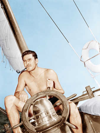 Errol Flynn relaxing on his yacht, ca. 1937 Photo