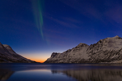 Comet Panstarrs and the Aurora Borealis Appear at Twilight over a Fjord in the Norwegian Sea Photographic Print by Babak Tafreshi