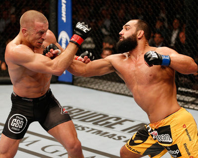 UFC 167: Nov 16, 2013 - Johny Hendricks vs Georges St-Pierre Photo by Josh Hedges