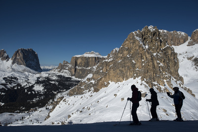 Skiers in the Italian Dolomites Prepares to Make their Way around the Sellaronda Photographic Print by Alex Treadway