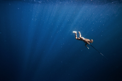 A Bajo Elder of Sampela, Spear Fishing on the Reef Photographic Print by Cory Richards