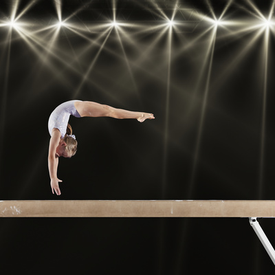 Young Female Gymnast on Balance Beam Photographic Print by Robert Decelis Ltd!