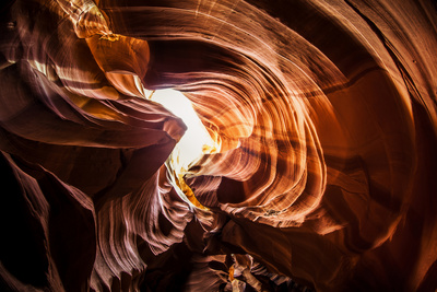 The Sandstone Walls of a Slot Canyon Eroded by Flash Floods Carrying Abrasive Sand Particles Photographic Print by Babak Tafreshi