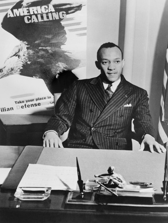 Jesse Owens, Seated at Desk, as National Coordinator of Racial Activities in 1942 Photo