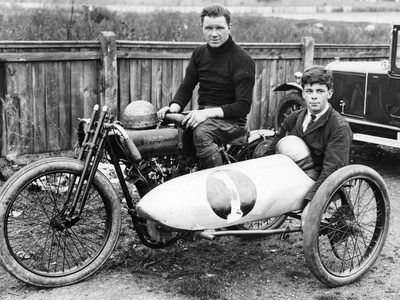 FW Dixon on a Harley-Davidson, with a Passenger in the Sidecar, 1921 Photographic Print