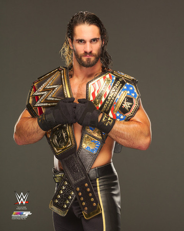 Seth Rollins with the World Heavyweight & United States Champions Belts 2015 Photo