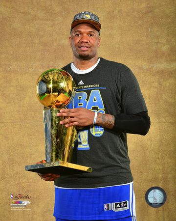 Marreese Speights with the NBA Championship Trophy Game 6 of the 2015 NBA Finals Photo