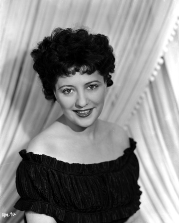 Helen Morgan on an Off Shoulder Dress and smiling Photo by  Movie Star News