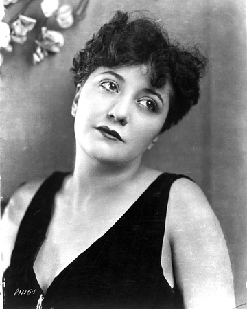 Helen Morgan on a Sleeveless Top Leaning Photo by  Movie Star News
