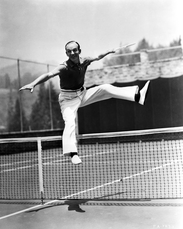 Fred Astaire Jumped Over Tennis Net in Black and White Photo by J Miehle