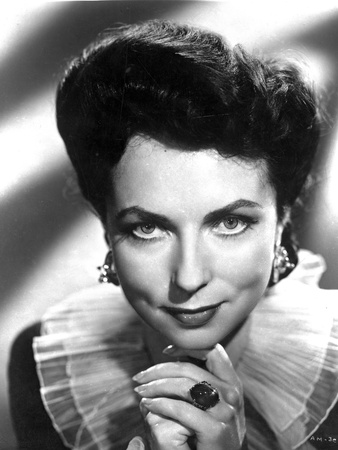 Agnes Moorehead Facing the Camera Showing Her Ring and Her Earrings Photo by  Movie Star News