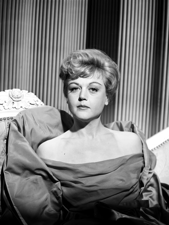 Angela Lansbury sitting on the Chair wearing a Dress Photo by  Movie Star News