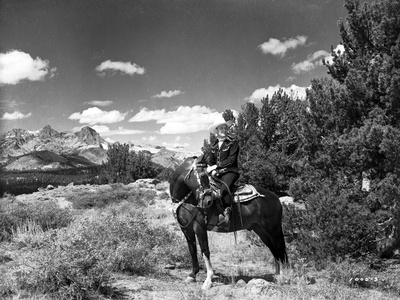 Gene Autry Riding a Horse in Black and White Portrait Photo by  Movie Star News