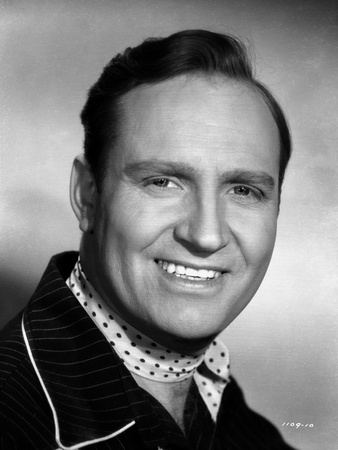 Gene Autry smiling in Black and White Portrait Photo by  Movie Star News