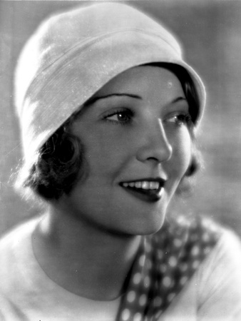 Dorothy MacKail on a Hat and smiling Photo by  Movie Star News