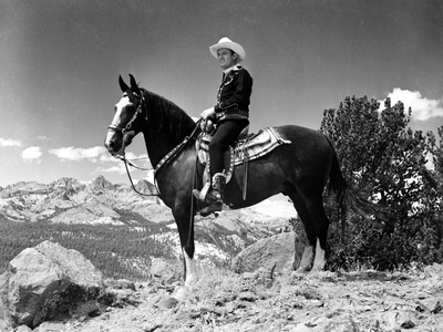 Gene Autry Riding a Horse in a Westerner Outfit Photo by  Movie Star News