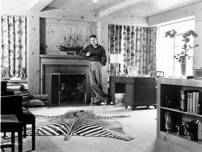 Errol Flynn standing Posed Leaning on a Fire Place Photo by  Movie Star News