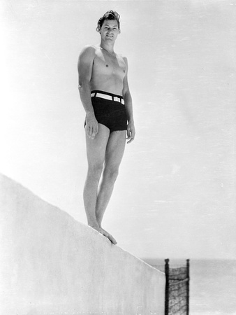 Johnny Weissmuller standing on Top of a Diving Board Photo by  Movie Star News