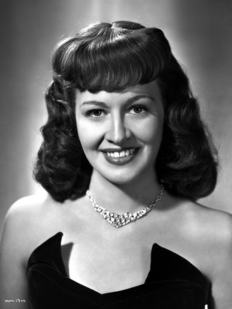 Marilyn Maxwell smiling in Black Dress with Necklace Photo by  Movie Star News