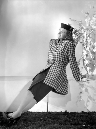 Nancy Kelly on a Checkered Dress sitting Photo by  Movie Star News