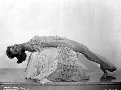 Mary Martin on a Ruffled Dress and Lying on Chair Photo by  Movie Star News