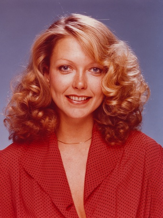 Susan Blakely smiling in Red Sweater Photo by  Movie Star News