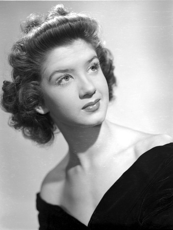 Peggy Ryan Looking Up wearing Black Dress in Black and White Portrait Photo by  Movie Star News