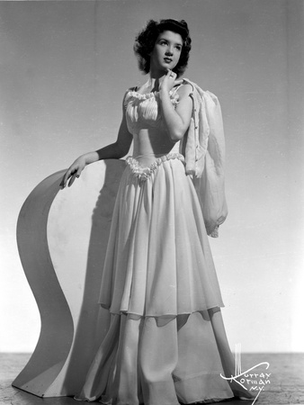 Peggy Ryan Posed wearing White Elegant Gown Photo by  Movie Star News