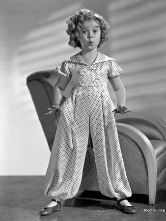 Shirley Temple wearing a Shirtdress with Cap-Sleeve with Matching Pants in Classic Portrait Photo by  Movie Star News