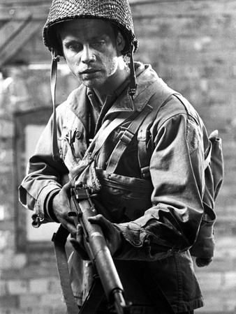 Mark Hamill standing in Military Uniform With Rifle Photo by  Movie Star News